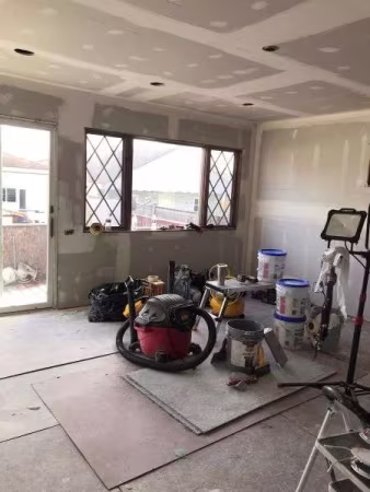 Drywall installation in progress